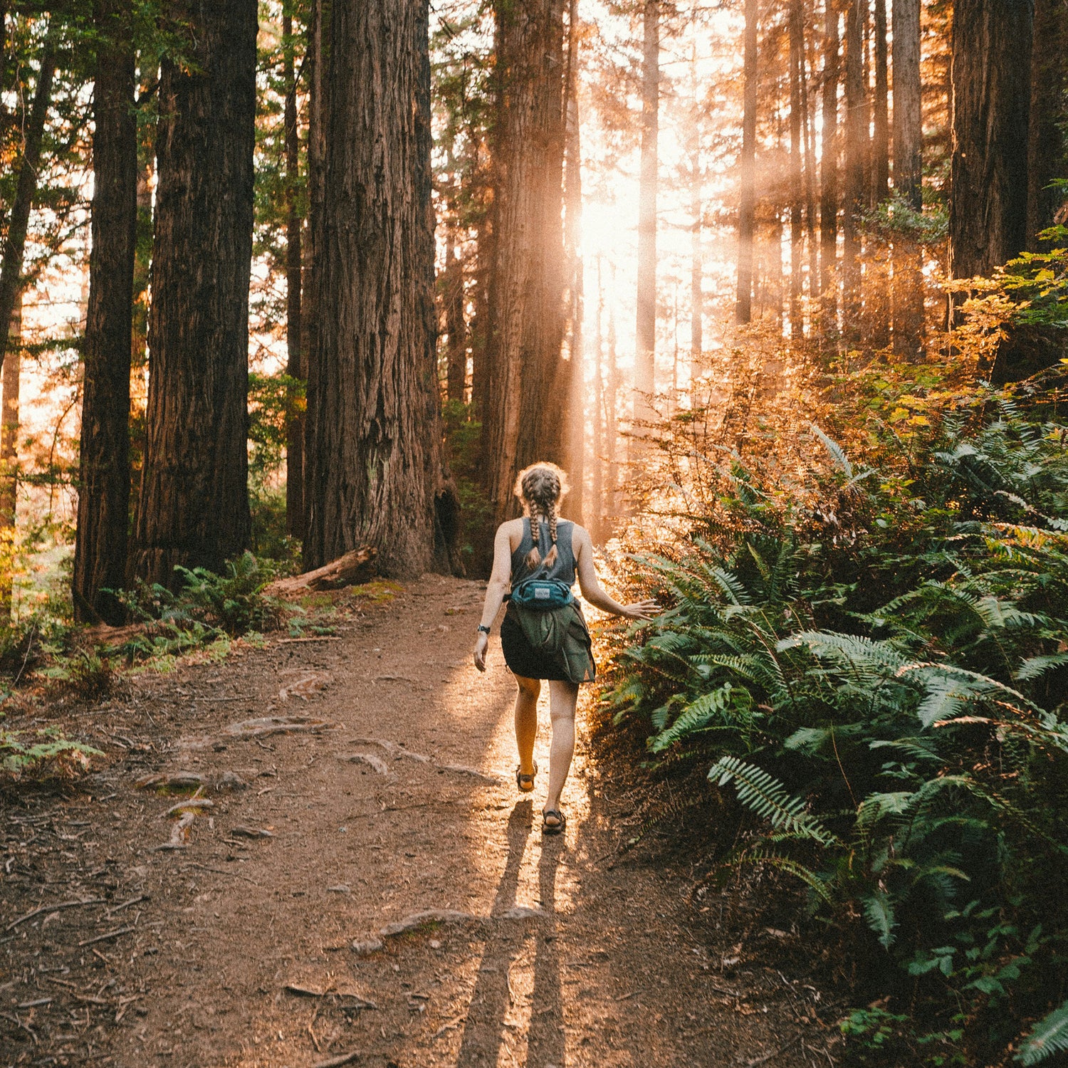 Woman walking in the woods