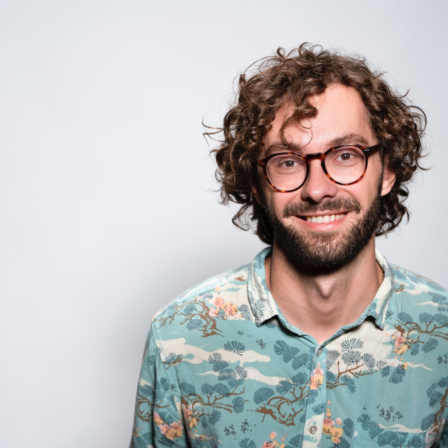 Mens Shoes Trendy Man with curly hair, flower shirt and round glasses